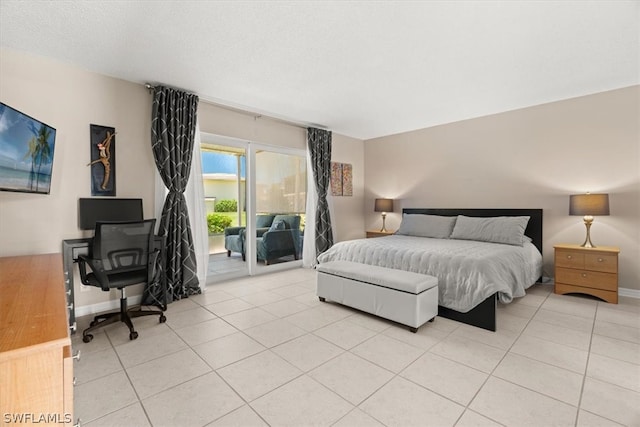 tiled bedroom with access to exterior