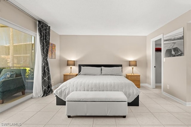 bedroom featuring light tile floors