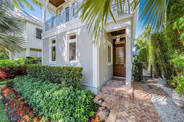 doorway to property featuring a balcony