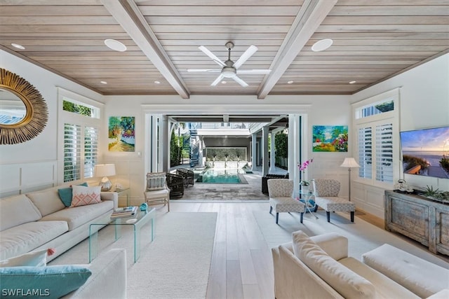 living room with wooden ceiling, ceiling fan, light wood-type flooring, and beam ceiling