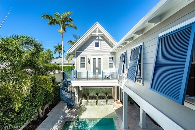 rear view of house with a patio