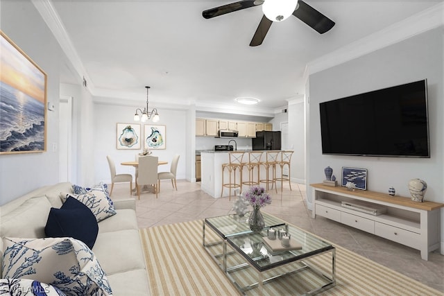 tiled living room featuring ceiling fan with notable chandelier and ornamental molding