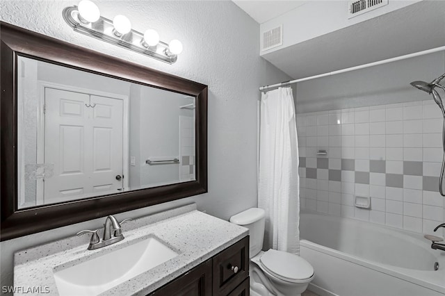 full bathroom with toilet, vanity, and shower / tub combo with curtain