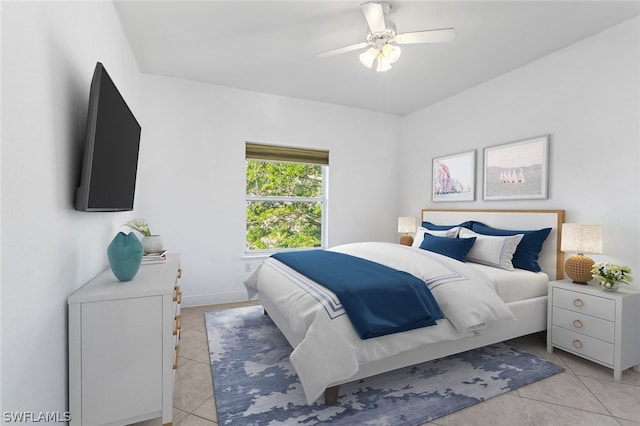 bedroom featuring ceiling fan and light tile floors