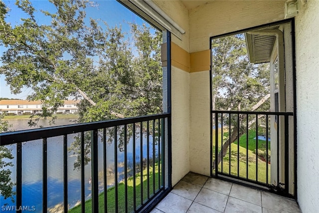 balcony featuring a water view