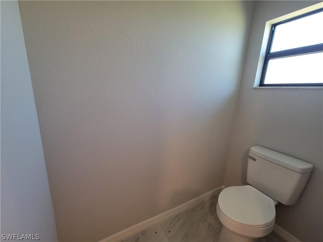 bathroom featuring toilet