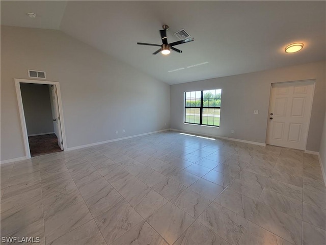 unfurnished room with ceiling fan and vaulted ceiling