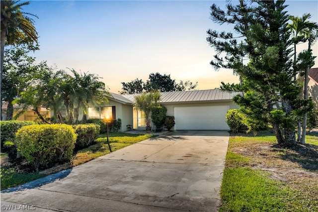 view of front of property featuring a garage