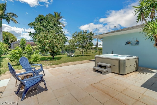 view of patio / terrace featuring a hot tub