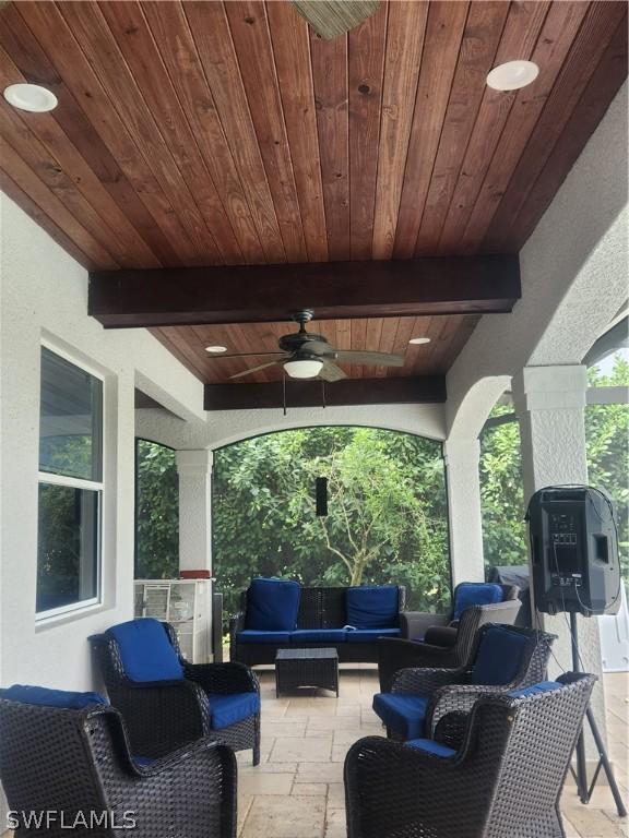 view of patio / terrace with ceiling fan and an outdoor hangout area