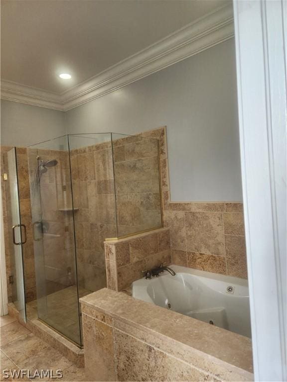 bathroom with independent shower and bath and ornamental molding