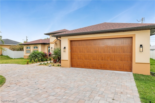 view of front of home featuring a garage