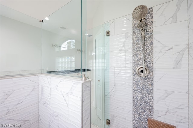 bathroom with an enclosed shower