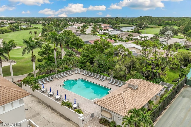 view of pool featuring central AC unit and a patio