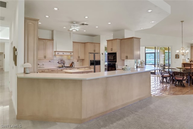 kitchen featuring black appliances, custom exhaust hood, light brown cabinetry, hanging light fixtures, and light tile patterned floors