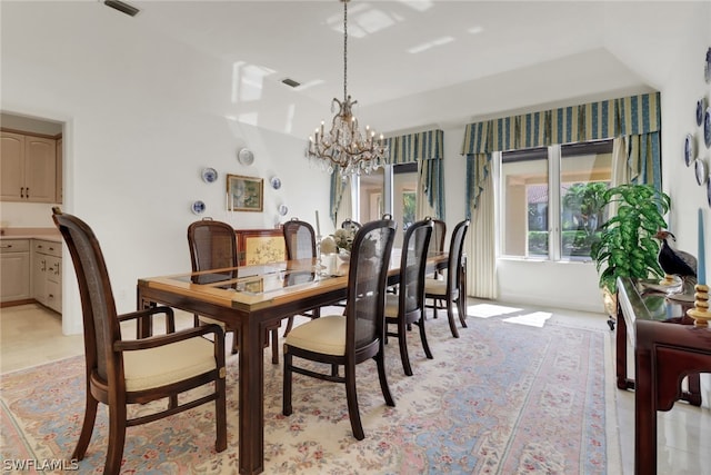 dining room with a chandelier