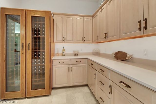 kitchen featuring light brown cabinets