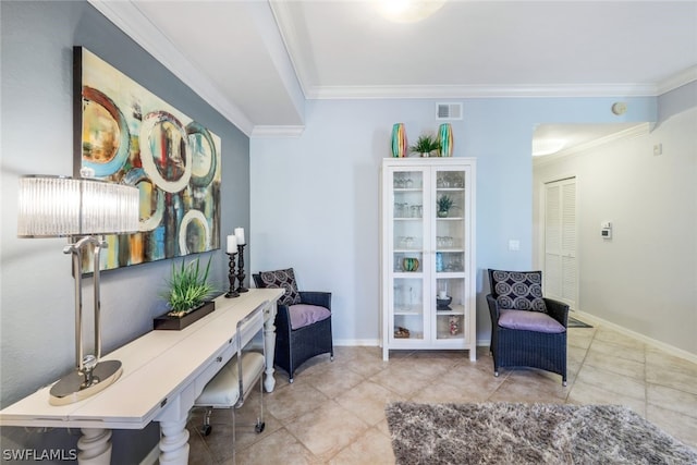 living area featuring crown molding and light tile patterned floors