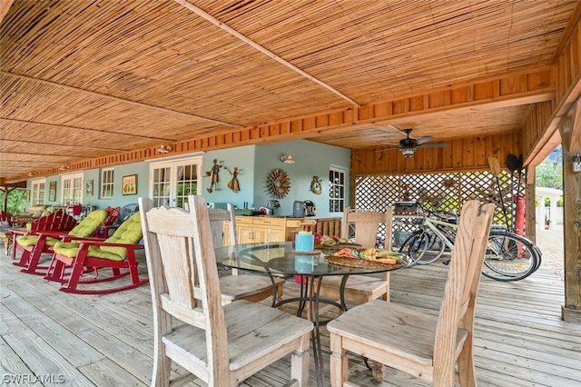 deck with a ceiling fan and outdoor dining area