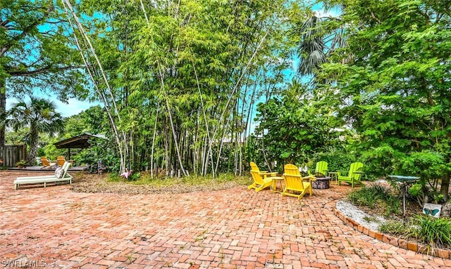 view of patio / terrace with a fire pit