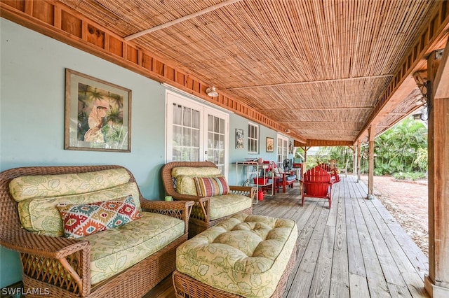 deck featuring outdoor lounge area