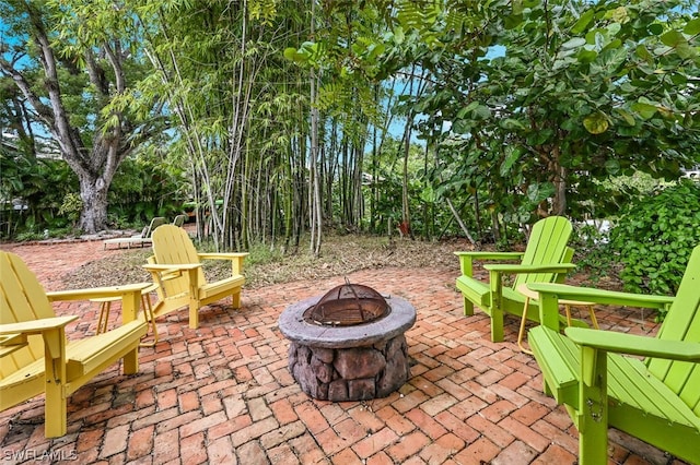 view of patio / terrace with an outdoor fire pit