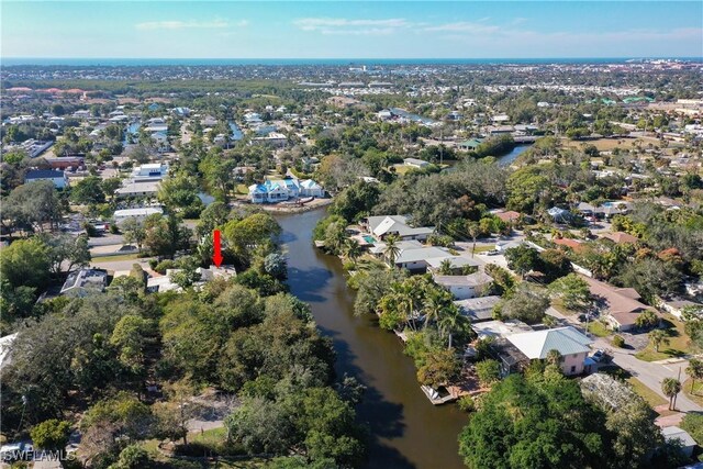 aerial view featuring a water view and a residential view