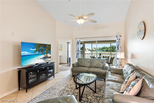 living room featuring high vaulted ceiling, ceiling fan, and light tile floors