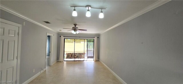 spare room with ceiling fan, track lighting, light tile patterned flooring, and crown molding