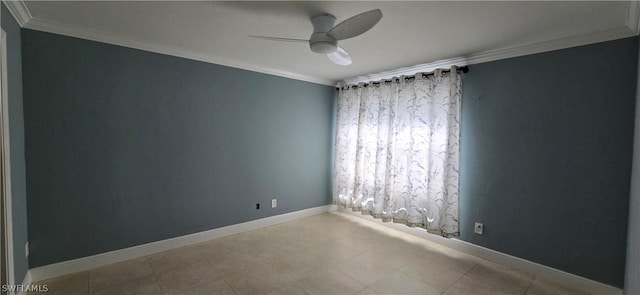 spare room featuring crown molding and ceiling fan