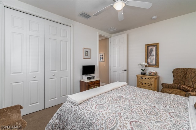 carpeted bedroom featuring a closet and ceiling fan