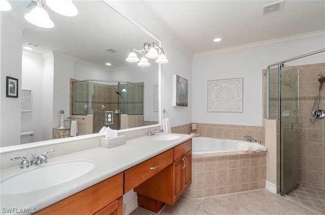 bathroom with ornamental molding, tile floors, shower with separate bathtub, and dual vanity