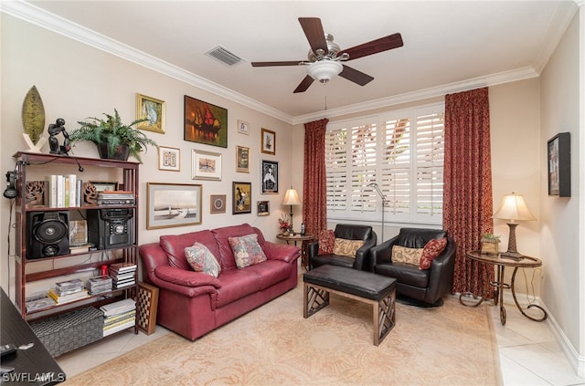 living room featuring ceiling fan, crown molding, and light tile floors