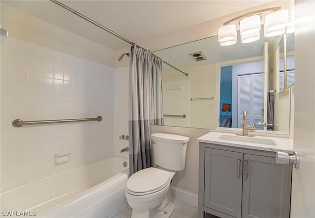 full bathroom featuring vanity, shower / bath combination with curtain, toilet, and tile flooring