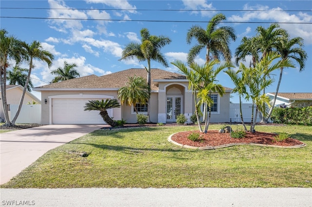 view of front facade with a garage and a front lawn