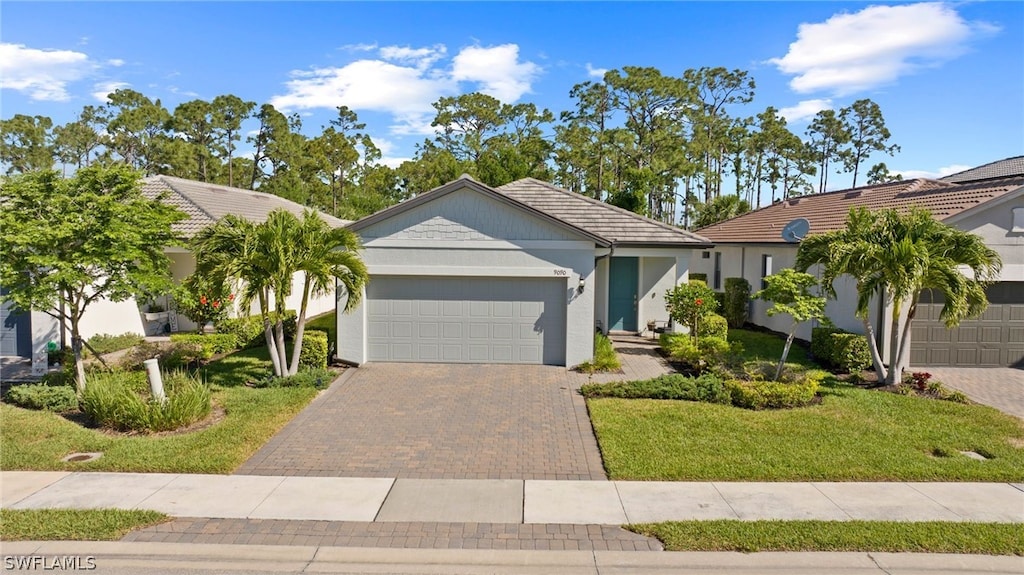 ranch-style home with a garage