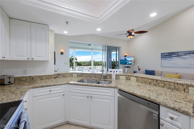 kitchen with white cabinetry, sink, light stone countertops, and appliances with stainless steel finishes