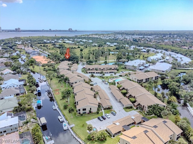 drone / aerial view featuring a water view