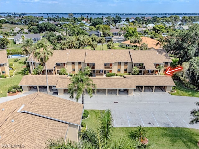 drone / aerial view featuring a water view