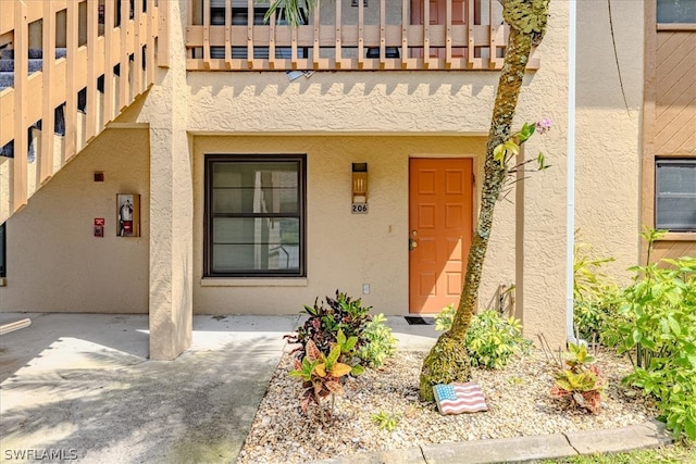 doorway to property featuring a balcony