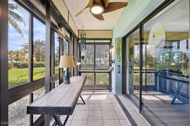 sunroom / solarium with ceiling fan