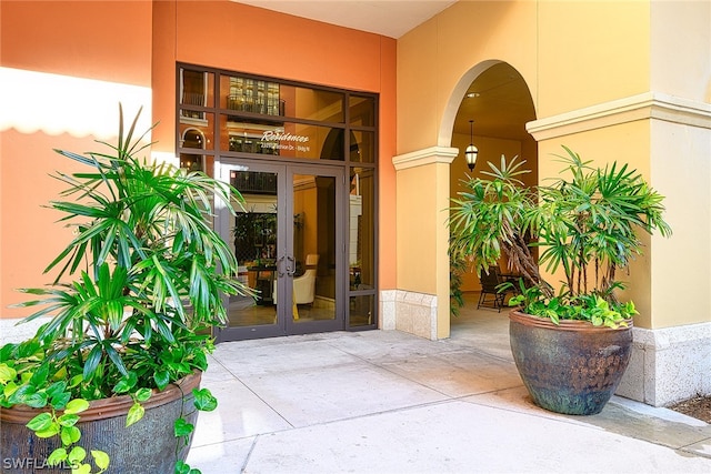 property entrance featuring french doors