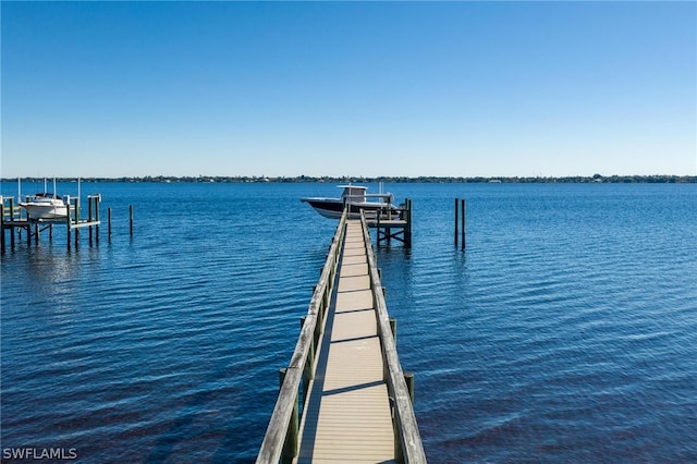 view of dock with a water view