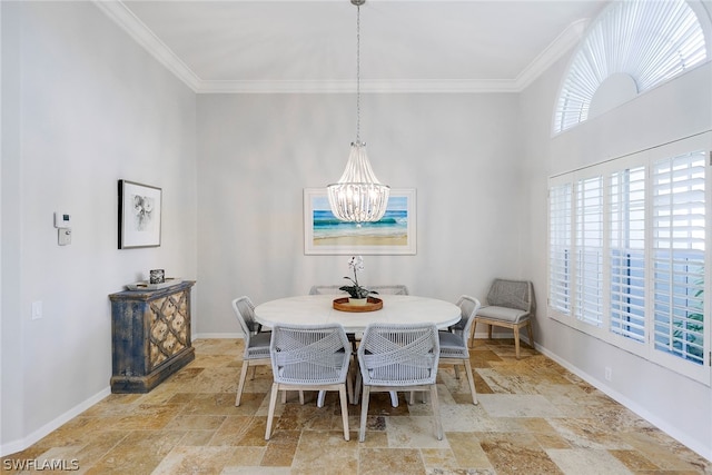 tiled dining room with a notable chandelier and crown molding