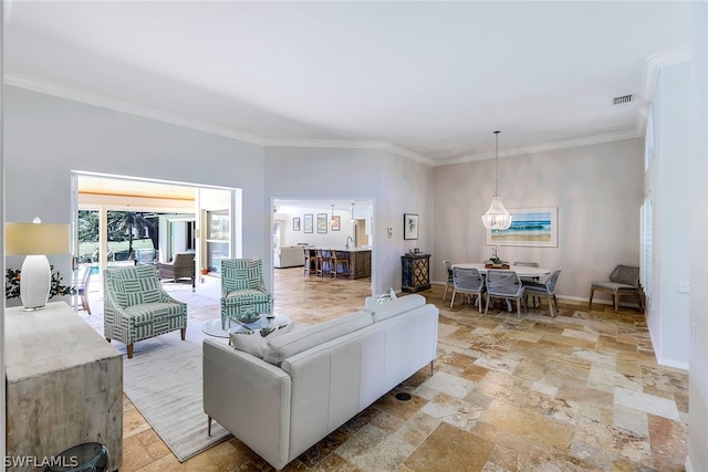 living room featuring light tile flooring and crown molding