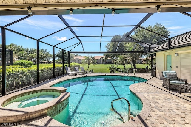 view of swimming pool featuring glass enclosure, an in ground hot tub, and a patio area