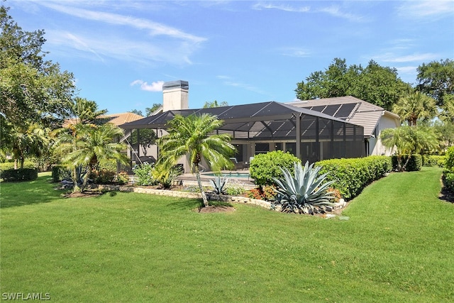 view of yard with a lanai