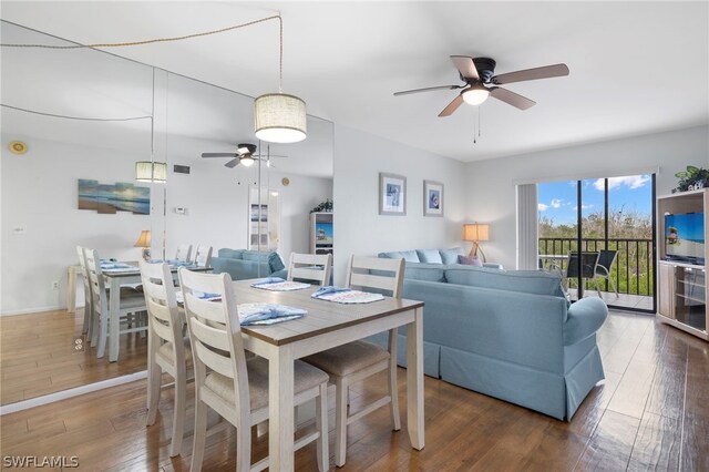 dining room featuring dark hardwood / wood-style flooring and ceiling fan