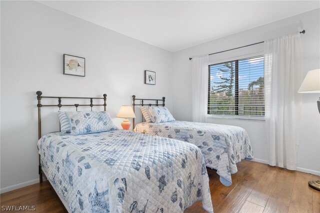 bedroom with wood-type flooring