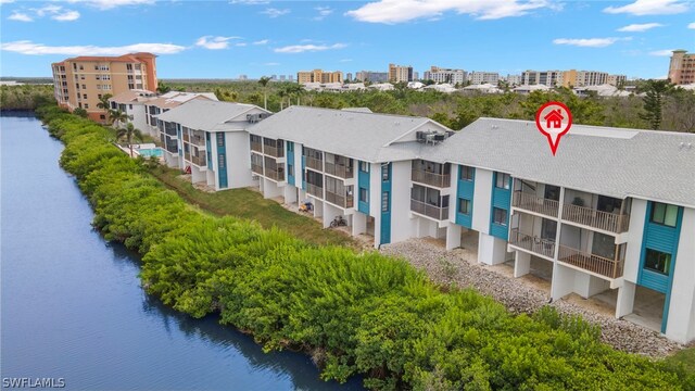 bird's eye view with a water view